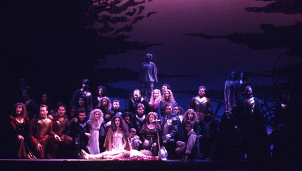 stage full of singers in an opera